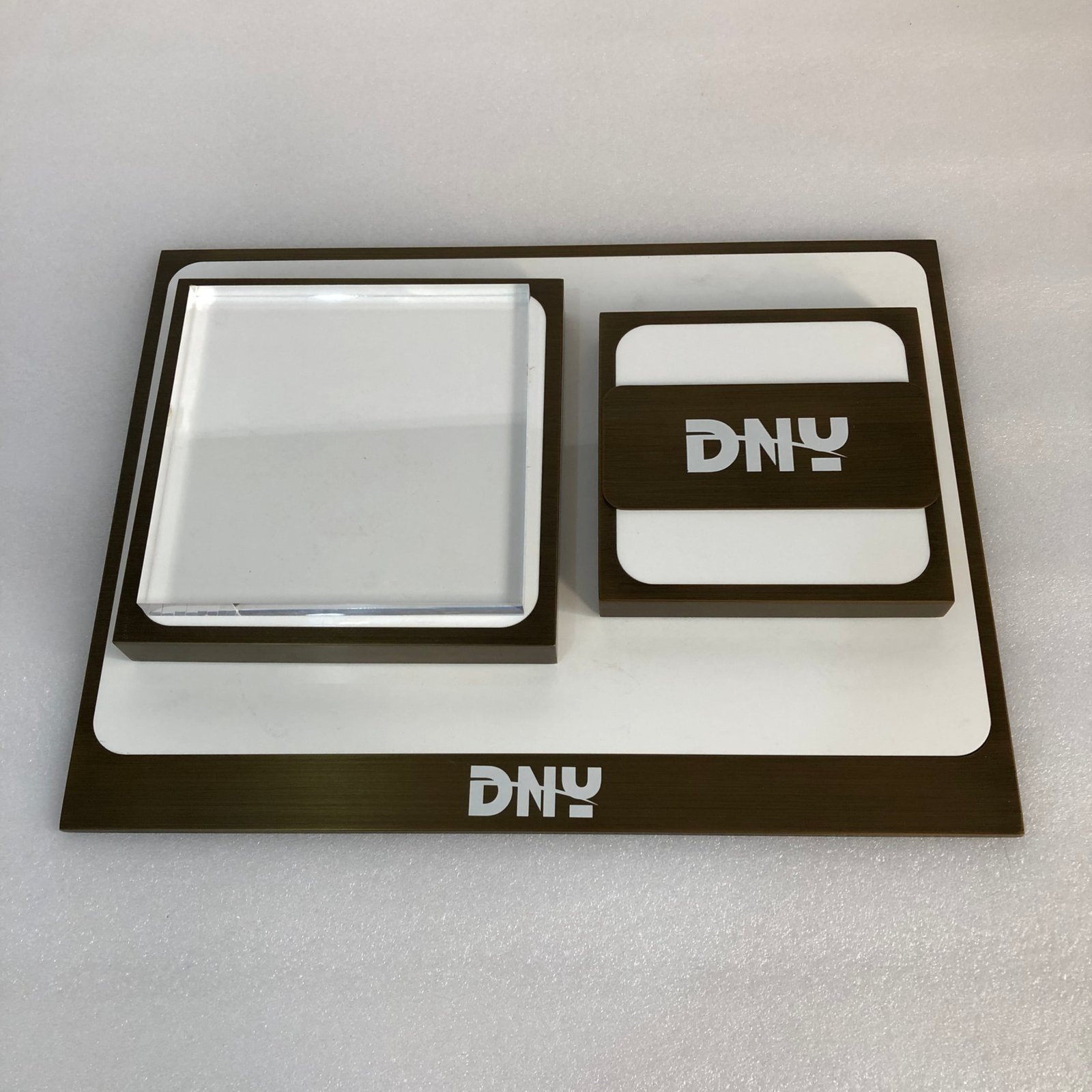 Custom electronics display stands -- phone holders, headphone stands and tablet mounts for tech retail, Huawei approved fixtures by DNY Display