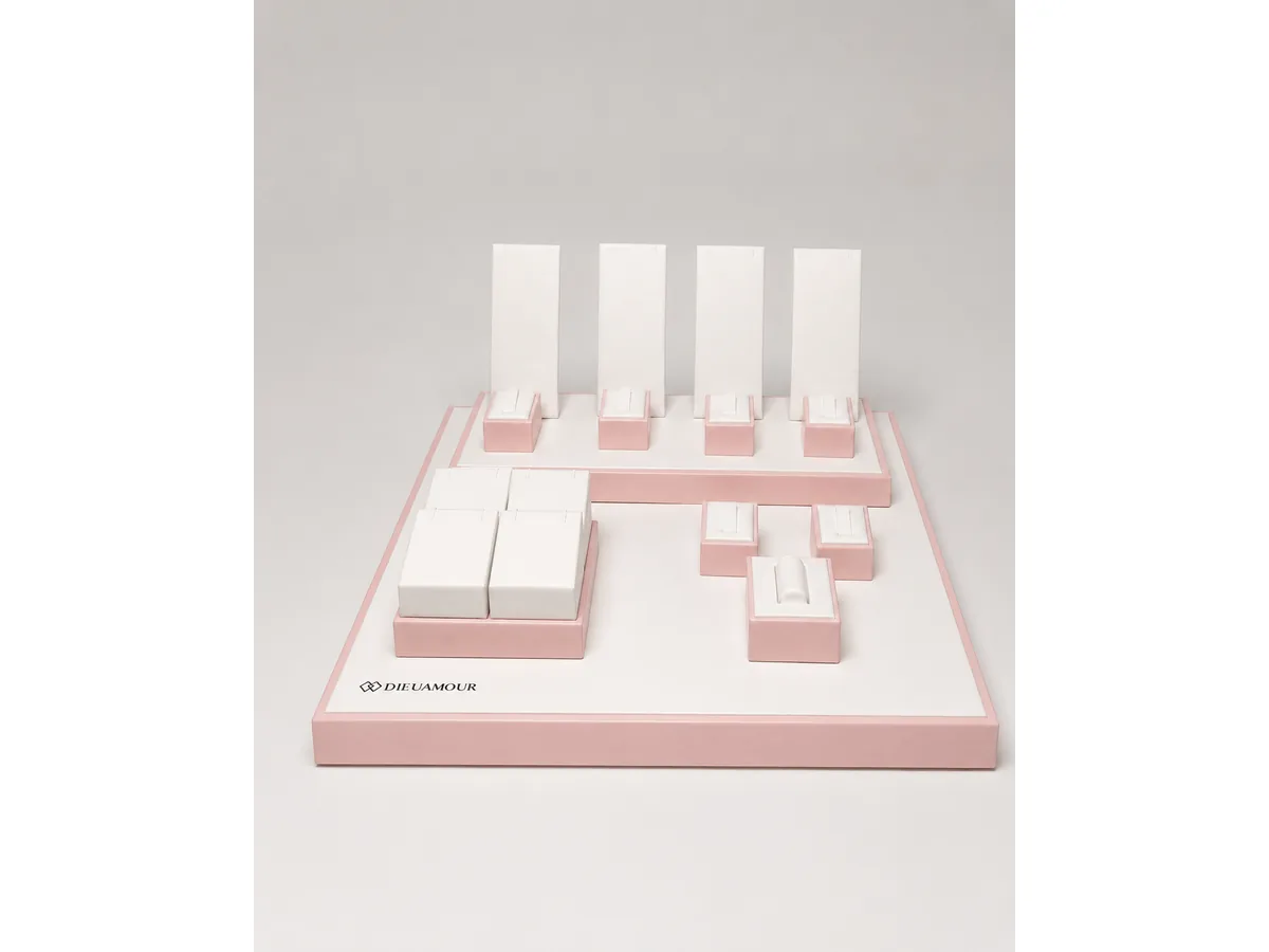 Finished custom jewelry display production sample in pink and ivory