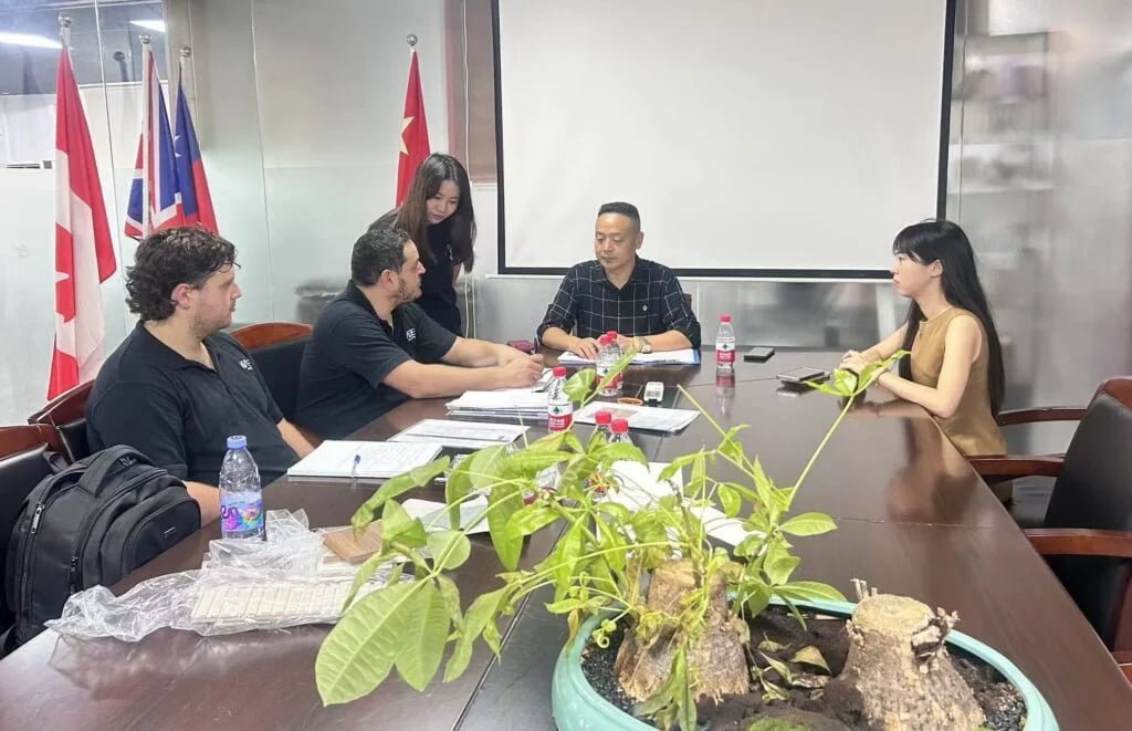 DNY Display team meeting with international clients to discuss a custom display project