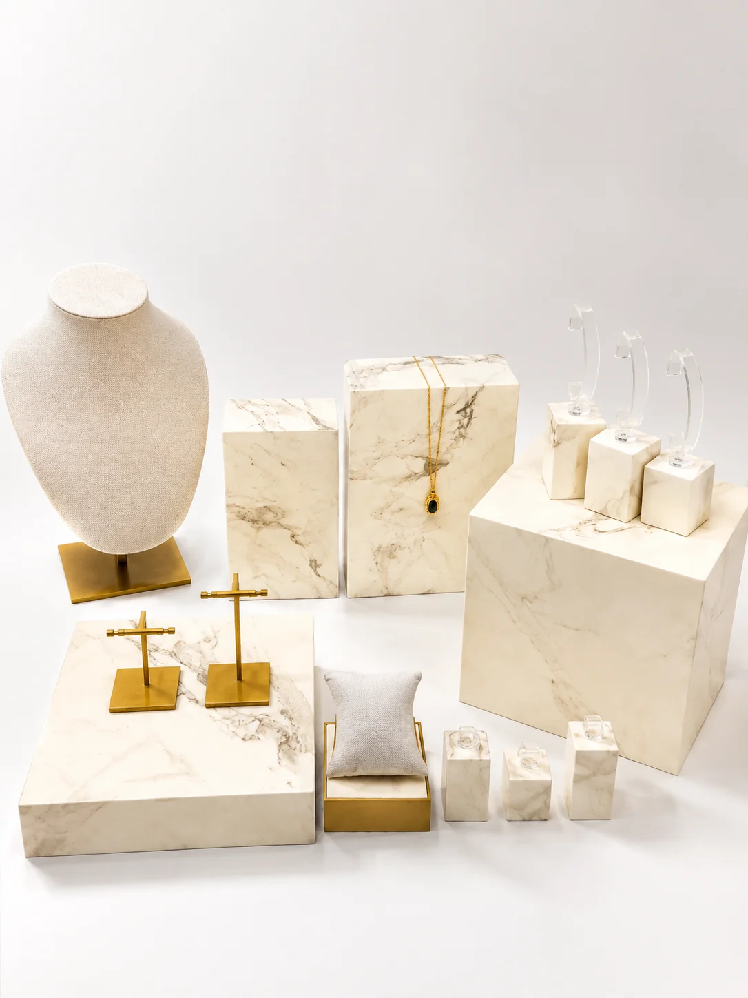 Luxury custom marble and gold jewelry display collection by DNY Display