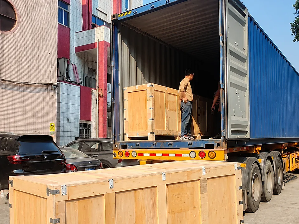 Custom retail fixtures protected in reinforced export wooden crates and loaded into a shipping container