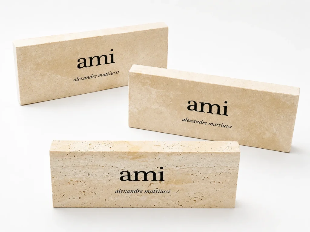 Custom travertine logo blocks for branded retail displays