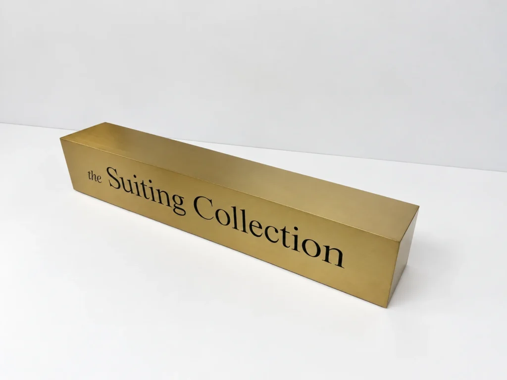Custom Freestanding Metal Logo Sign with Brushed Gold Finish