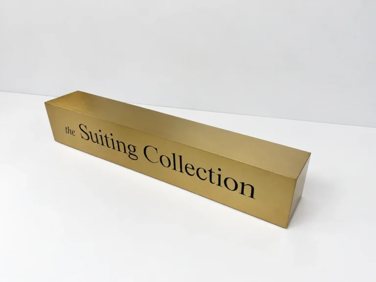 Custom Freestanding Metal Logo Sign with Brushed Gold Finish